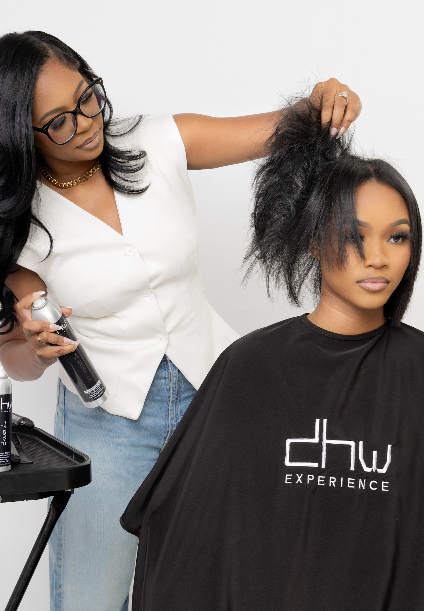 Kayla Johnson demonstrating advanced hairstyling skills – DHW University